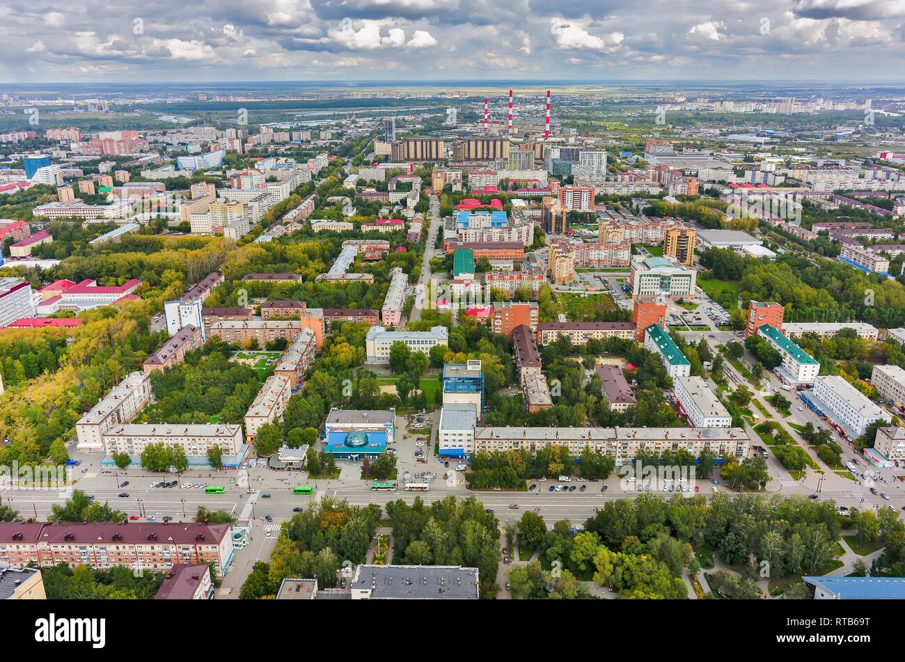 Tyumen, Russia - August 25, 2015: Bird eye view on urban quarters. Space cinema house and building of Savings Bank. Respubliki and Tulskaya streets Stock Photo