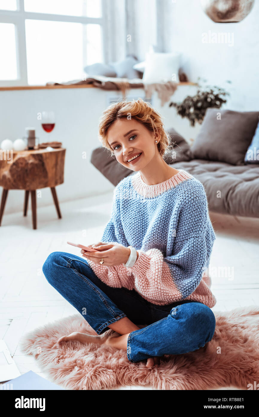Delighted positive nice woman smiling to you Stock Photo