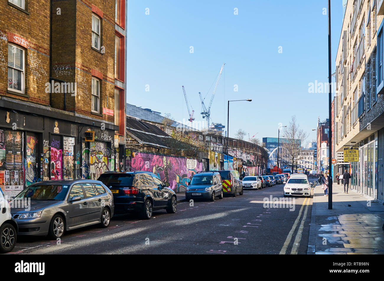 Sclater Street in Shoreditch, East London UK, with street art and graffiti Stock Photo
