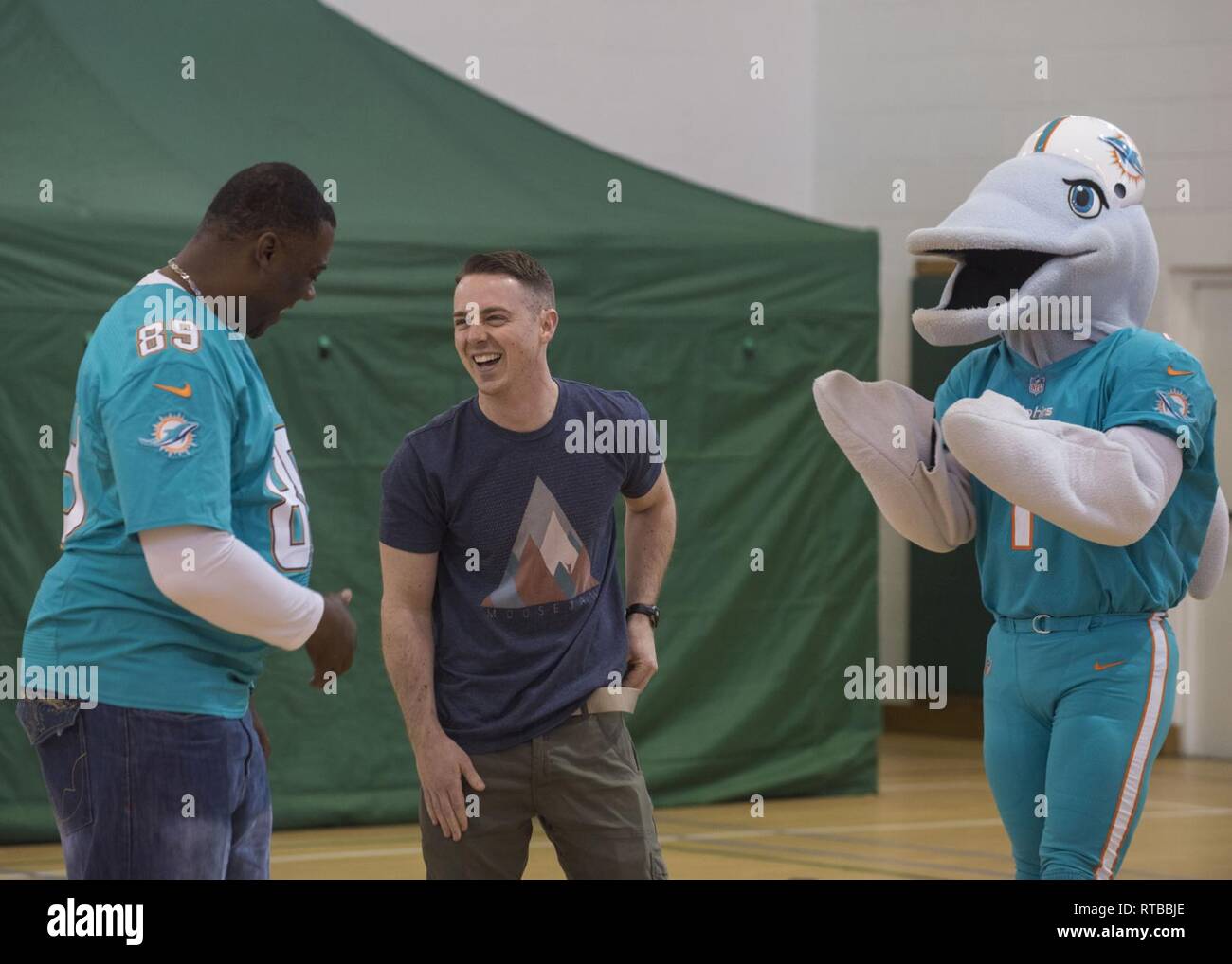 423rd Force Support Squadron hosts the Miami Dolphin Cheerleaders Feb. 2, 2019, at RAF Alconbury, United Kingdom during the 2019 Superbowl weekend. The cheerleaders conducted a cheer camp for base personnel. Stock Photo