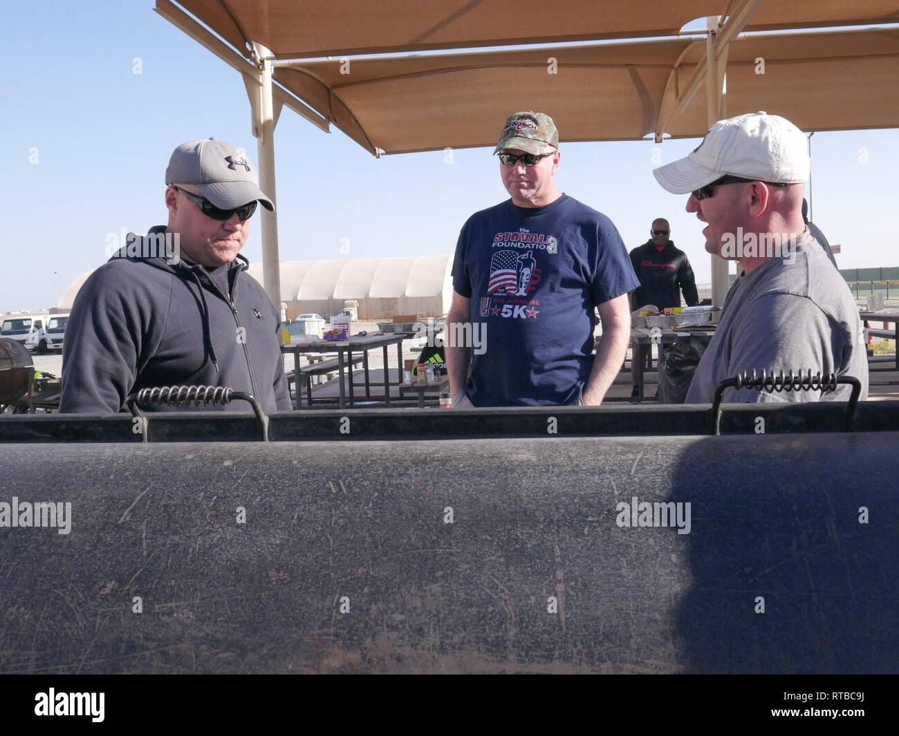 Soldiers of the 184th Sustainment Command cooked out and enjoyed Sunday afternoon together before Super Bowl LIII at Camp Arifjan, Kuwait, Feb. 3, 2019. Stock Photo