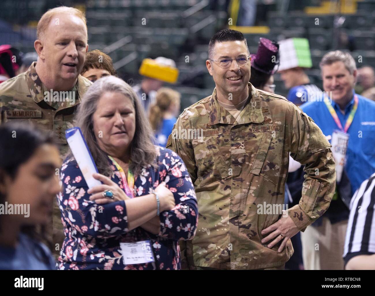 Lt. Gen. Robert D. McMurry, Air Force Life Cycle Management Center commander, left, and Col. Thomas P. Sherman, 88th Air Base Wing and Wright-Patterson Air Force Base installation commander, watch the competition in the FIRST LEGO League Ohio championship tournament in the Nutter Center on Wright State University, Dayton, Feb. 3, 2019. The Wight-Patterson AFB Educational Outreach office as part of its mission to provide educational enrichment in the areas of science, technology, engineering and math. Stock Photo