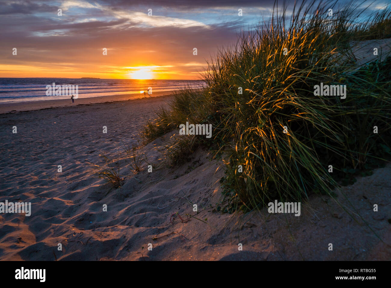 Sunset in Sainte Barbe beach in Brittany in France Stock Photo