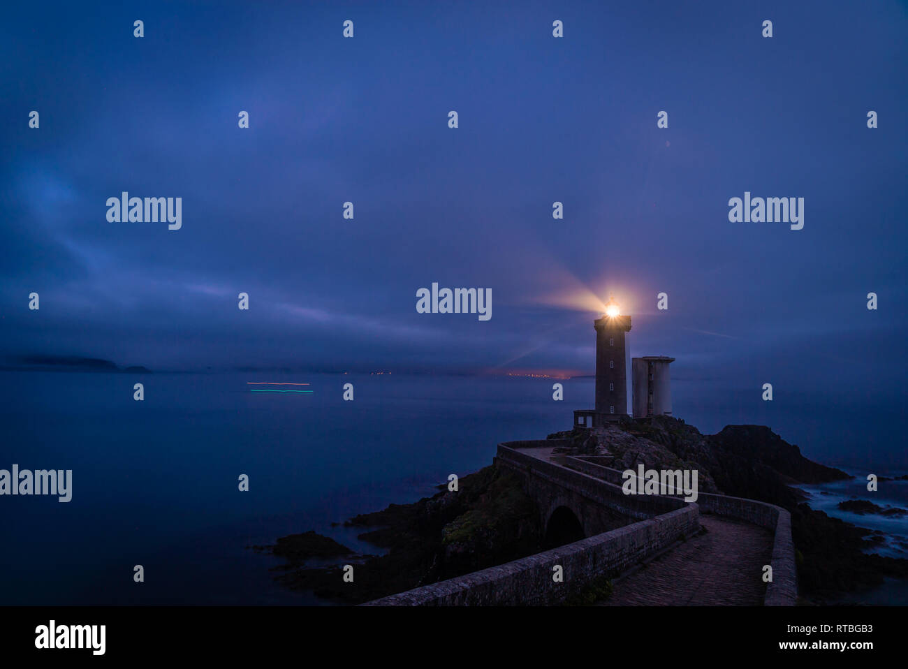 Petit minou lighthouse at night with light beam shining Stock Photo
