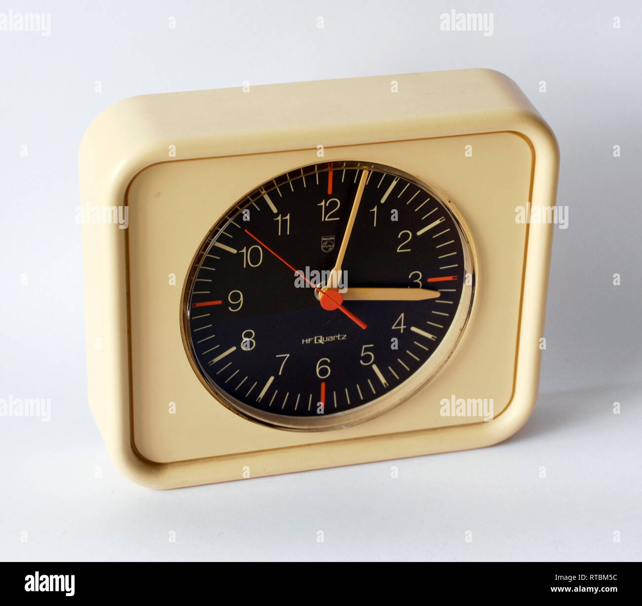 Vintage wall clock. Plastic, original from the seventies Stock Photo