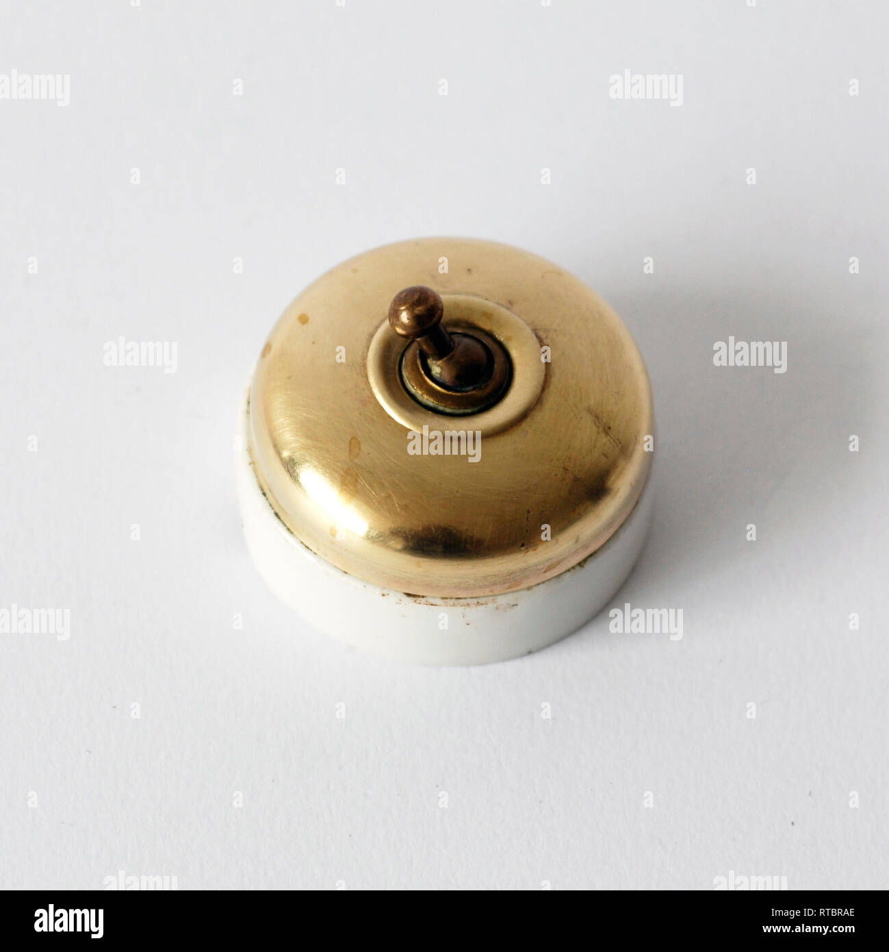 Vintage porcelain and brass switch Stock Photo