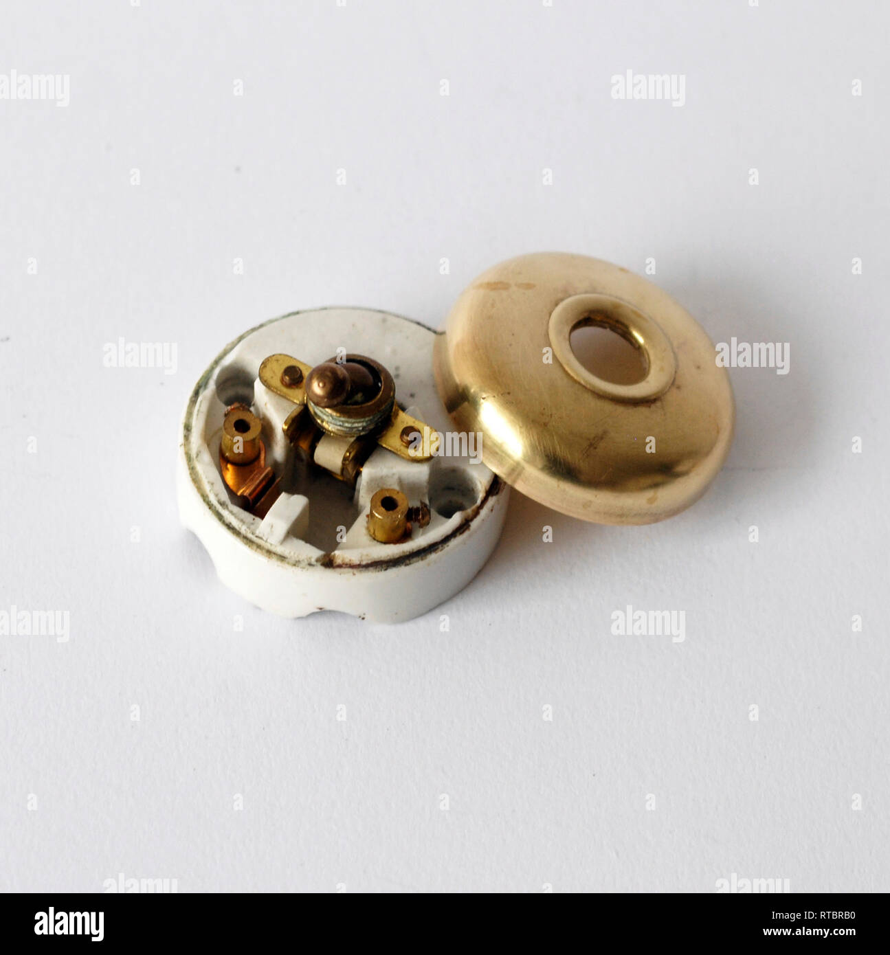 Vintage porcelain and brass switch Stock Photo