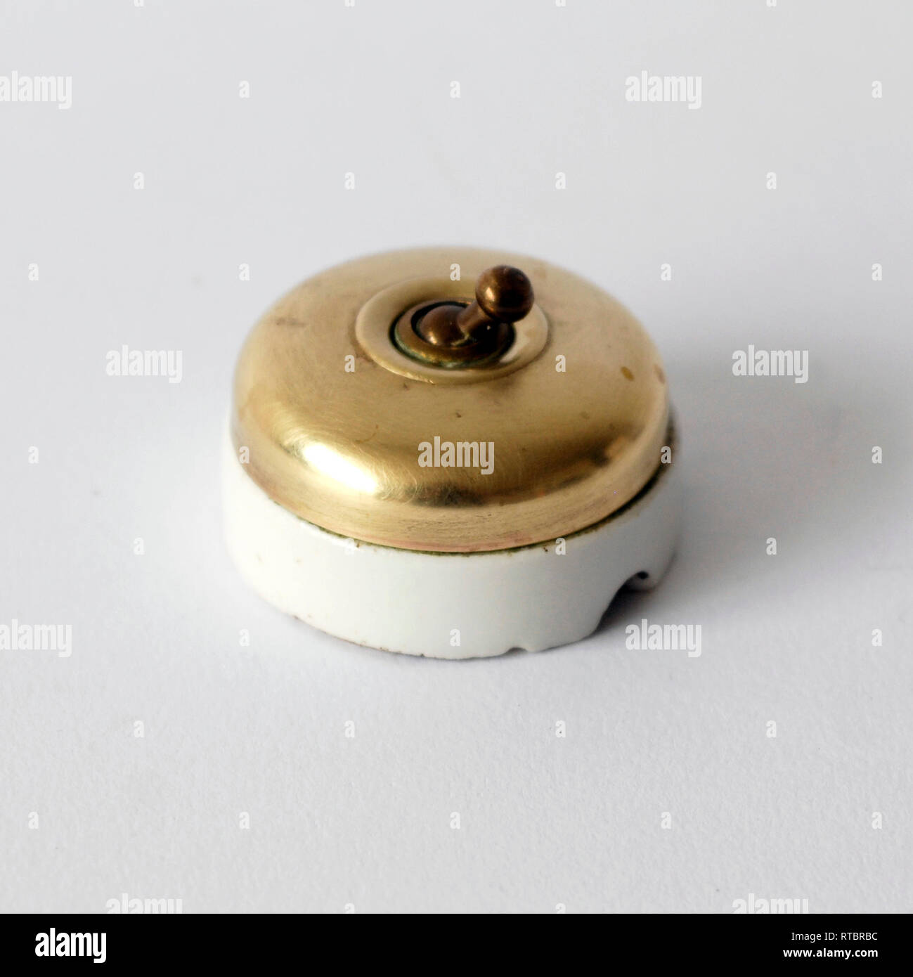 Vintage porcelain and brass switch Stock Photo
