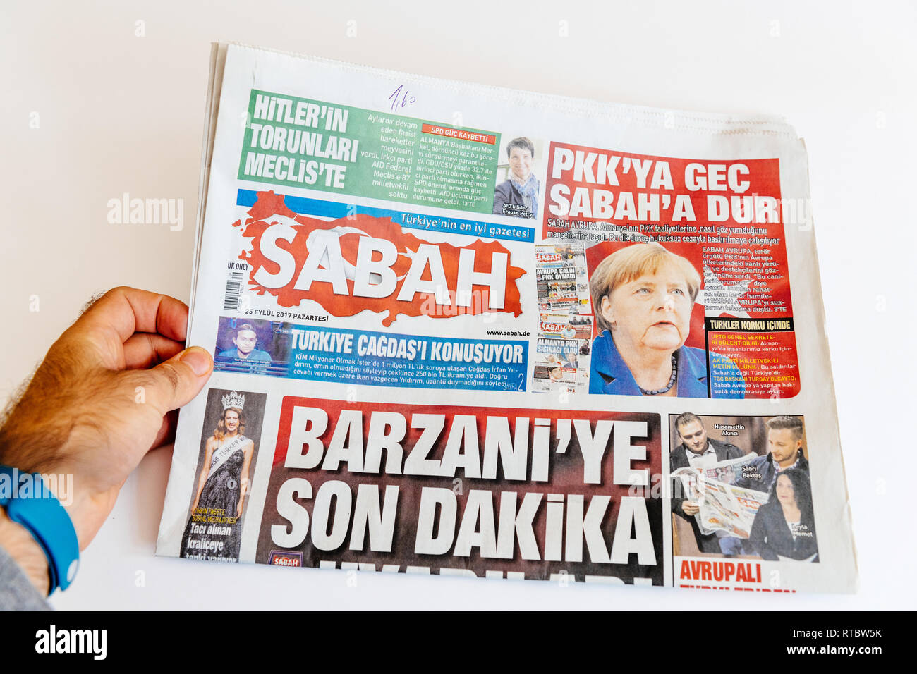 PARIS, FRANCE - SEP 25, 2017: Sabah  Turkish daily newspaper with portrait of Angela Merkel after election in Germany for the Chancellor of Germany, the head of the federal government Stock Photo