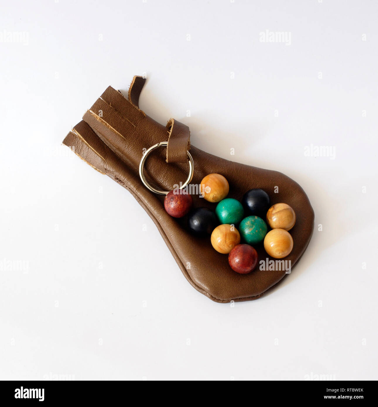 Old toy marbles in leather bag Stock Photo - Alamy