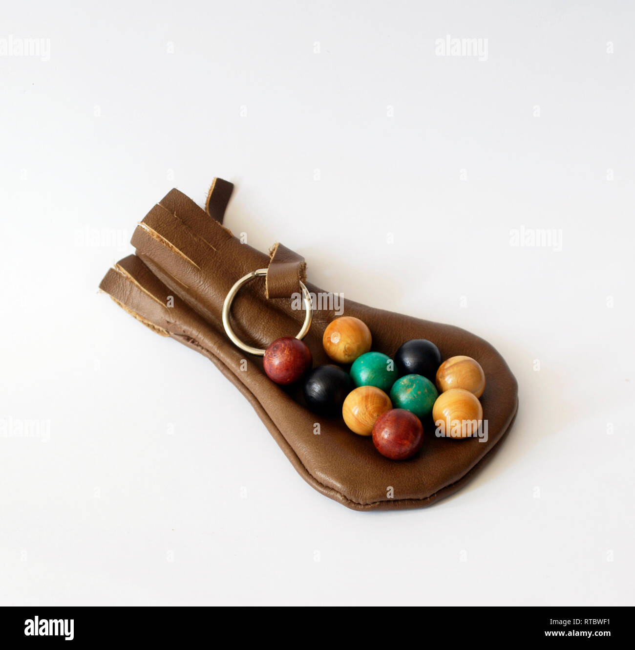 Old toy marbles in leather bag Stock Photo - Alamy