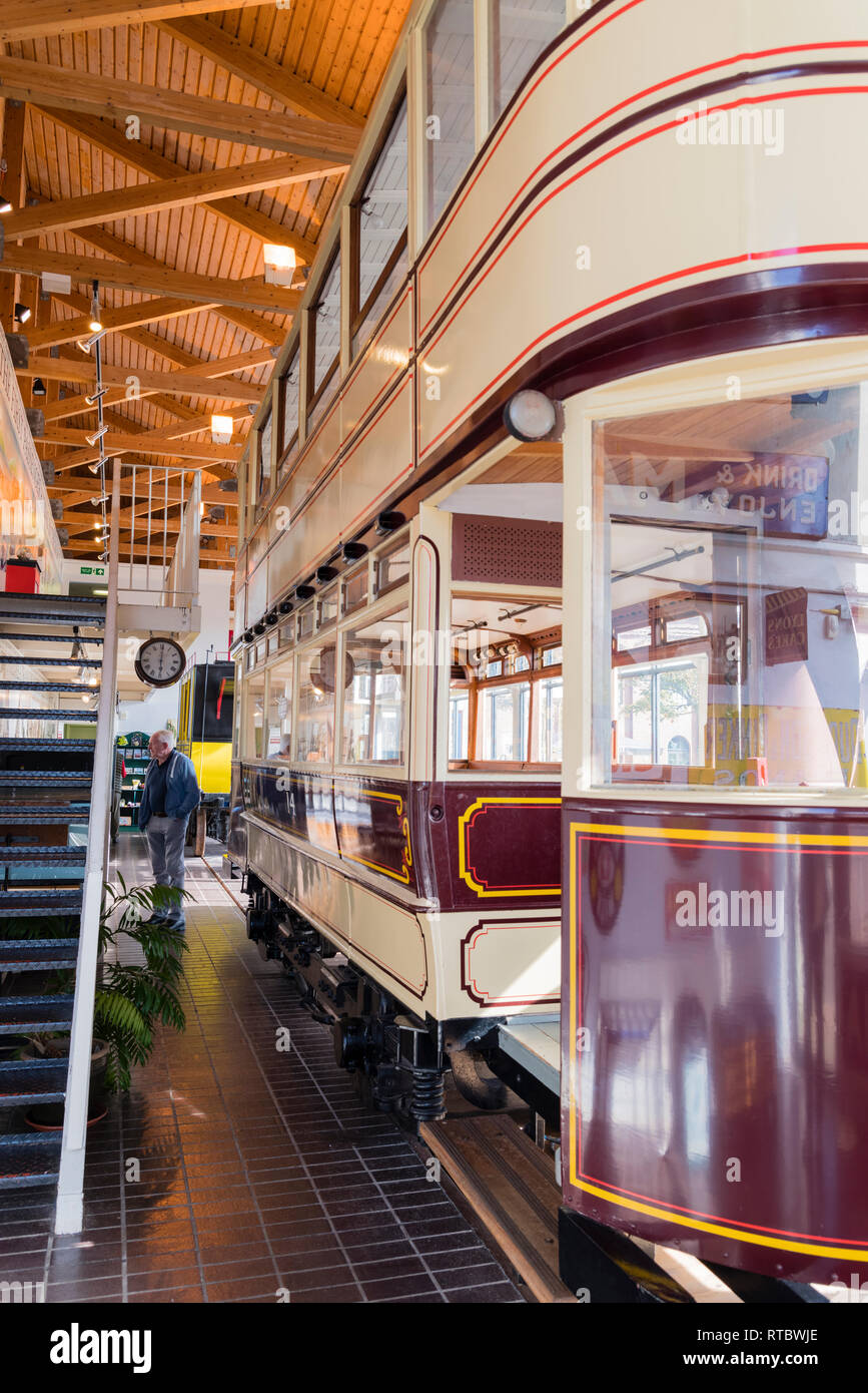 A double decker tram inside the Tram Shed, the tram museum on the marina waterfront at Swansea, South Wales Stock Photo