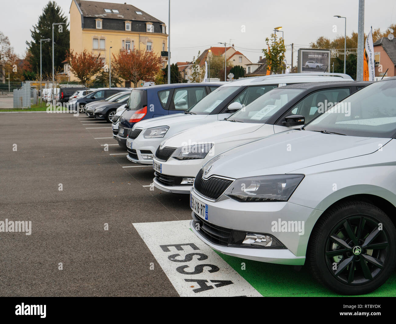 PARIS, FRANCE - NOV 7, 2017: Essai text translated as Test Drive cars with row of new Skoda Superb and Octavia cars made by Volkswagen at the car dealership garage Stock Photo