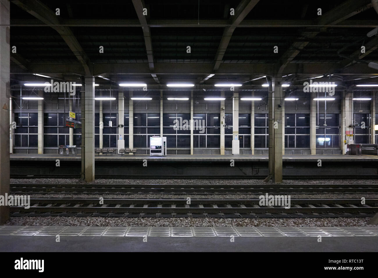 An empty station at night on the Joetsu Shinkansen (bullet train) line in Niigata, Japan. Stock Photo