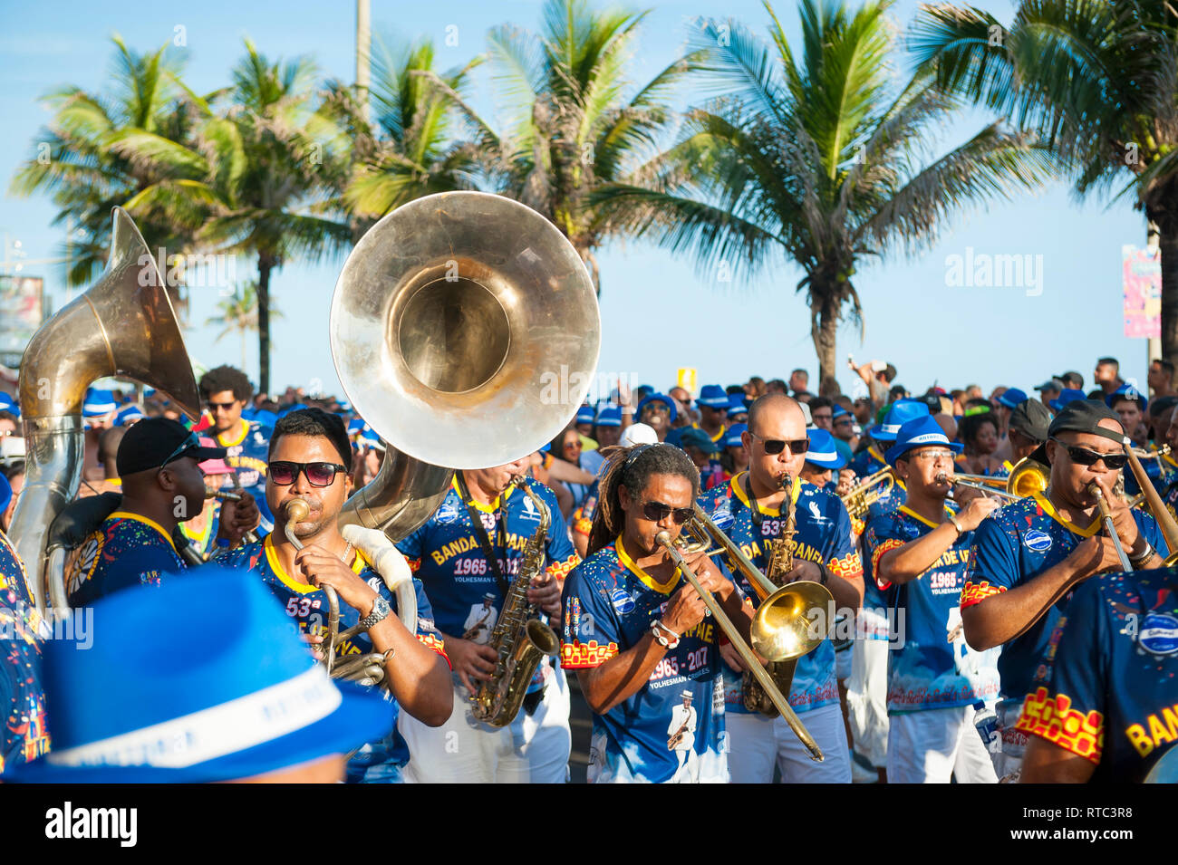 RIO DE JANEIRO - MARCH 15, 2017: A traditional Brazilian marching band attracts large crowds at the iconic Banda de Ipanema Carnival street party. Stock Photo