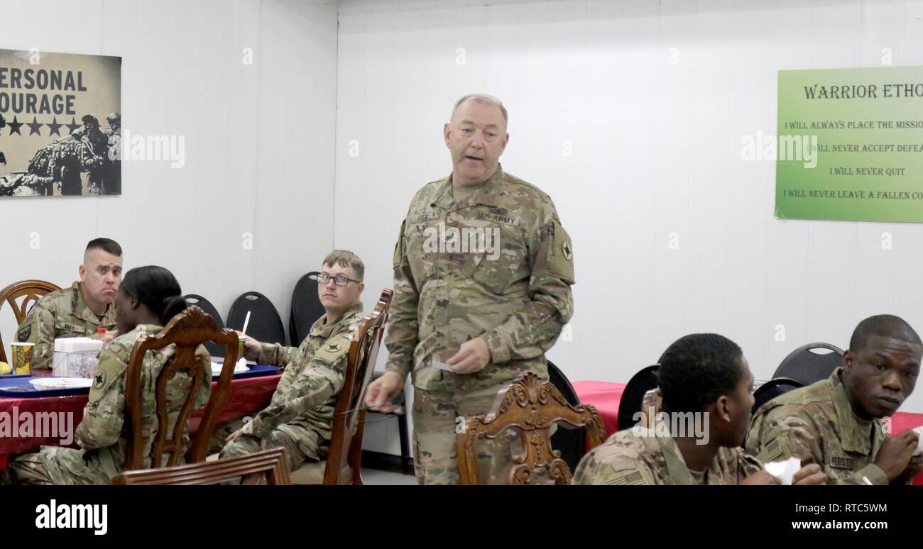 Command Sgt. Maj. Jason Little, Sr., 184th Sustainment Command, speaks to his enlisted Soldiers during a dinner at Camp Arifjan, Kuwait, Feb. 6, 2019. Stock Photo