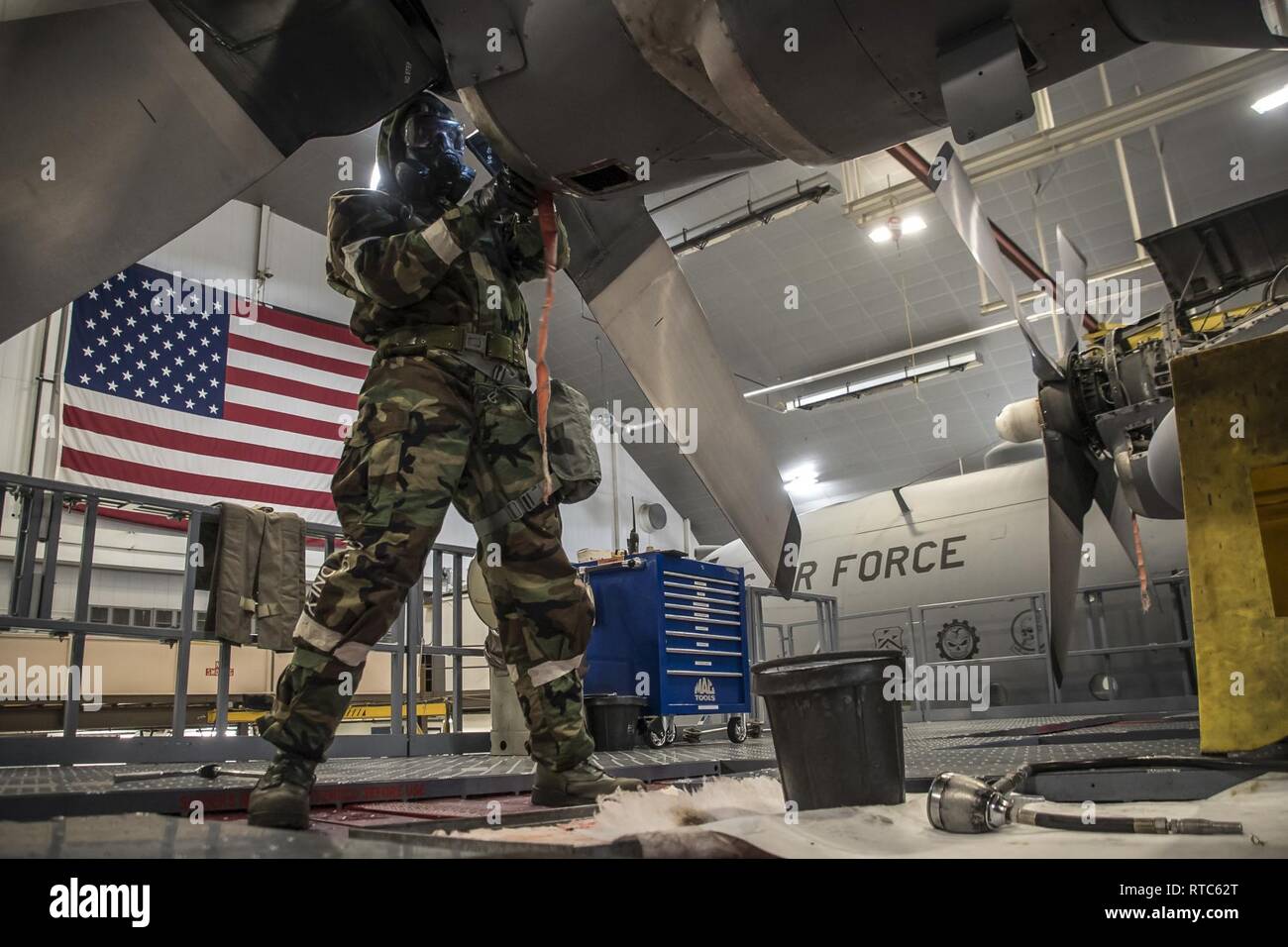 Airmen don Mission Oriented Protective Posture (MOPP) gear while ...