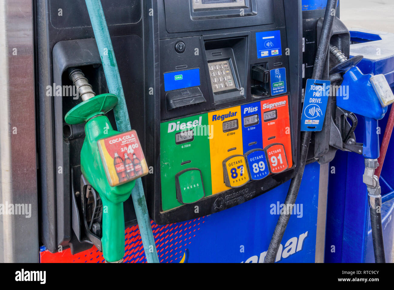 Self service petrol pump with Diesel, Regular, Plus and Supreme grades. Stock Photo
