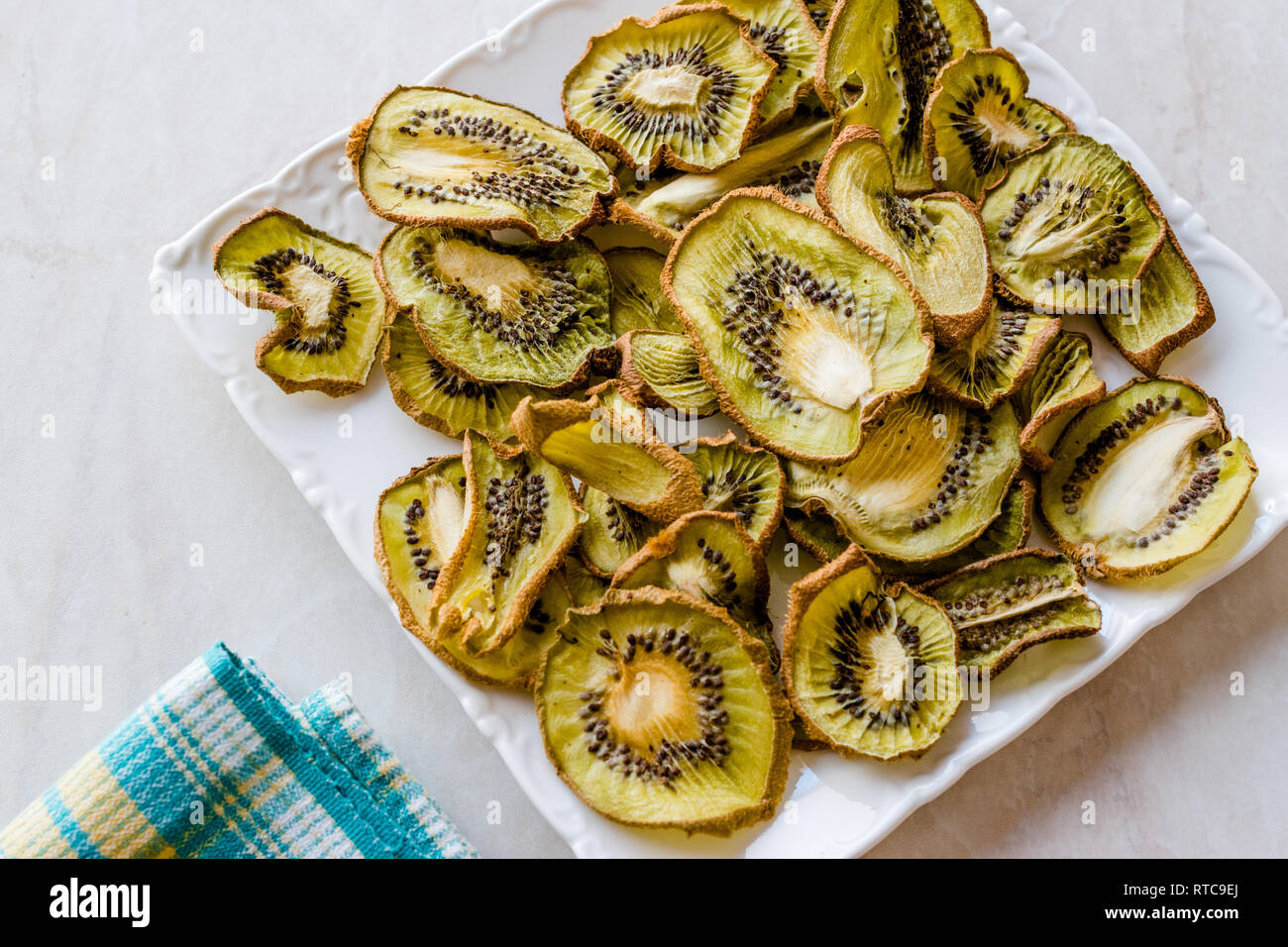 Dried Kiwi Slices with Plate / Organic Dry Fruit. Fresh Organic Food