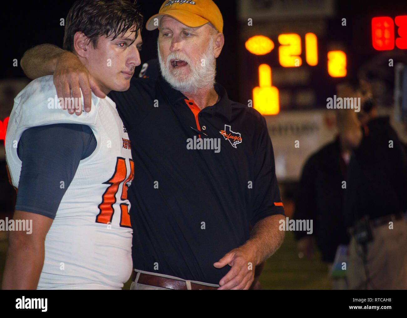 Refugio High School head football coach Jason Herring talks to