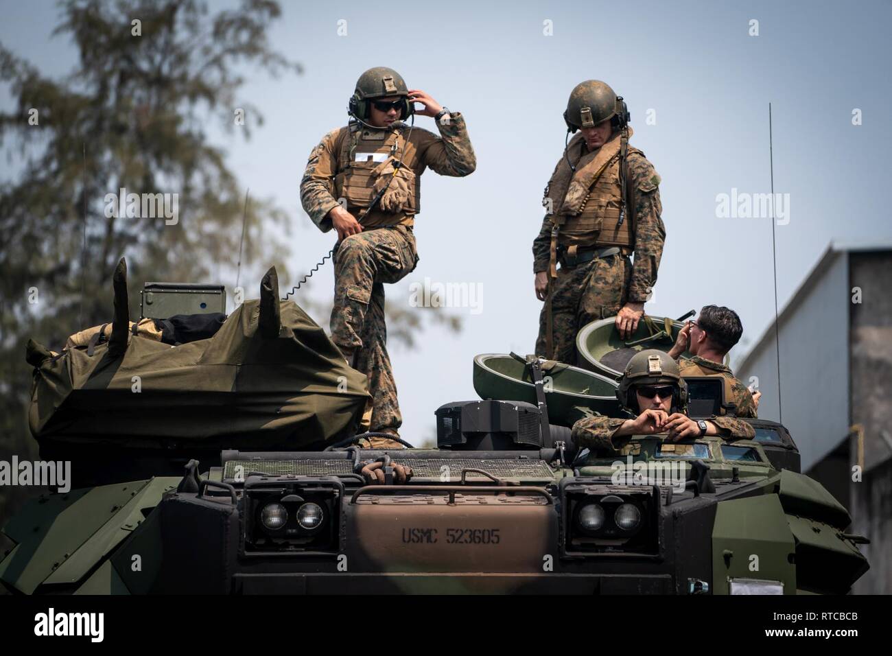 U.S. Marines prepare to depart for an assault amphibious battalion ...