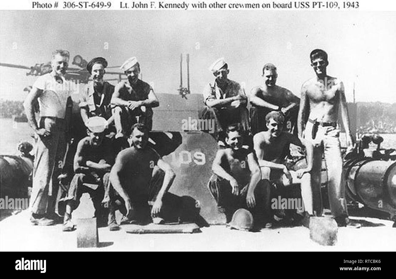 Navy Lt. j.g. John F. Kennedy Jr. with other crew members aboard USS PT-109, circa 1943. Stock Photo