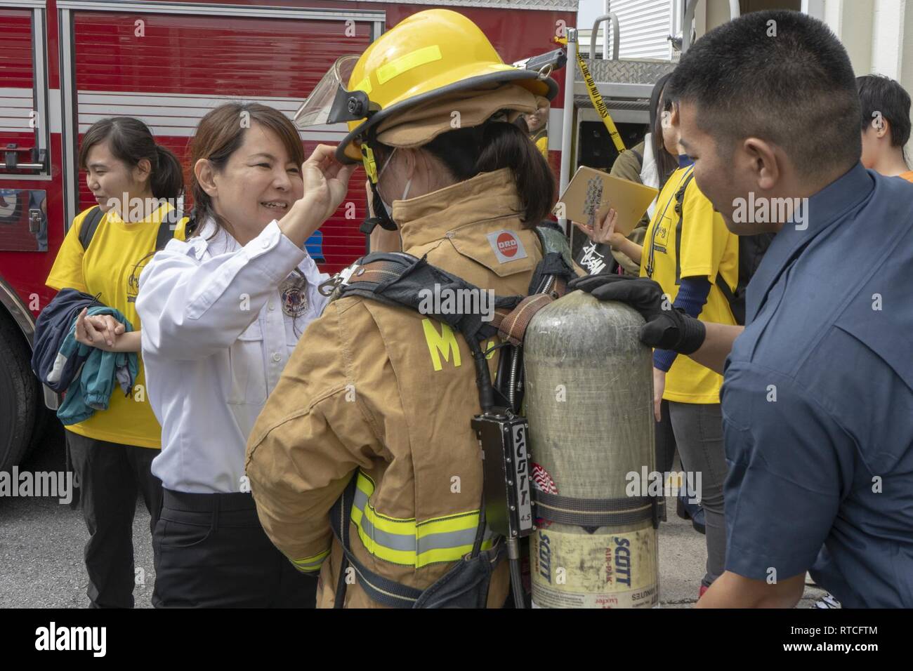 Firefighters with Marine Corps Installations Pacific Fire and Emergency ...