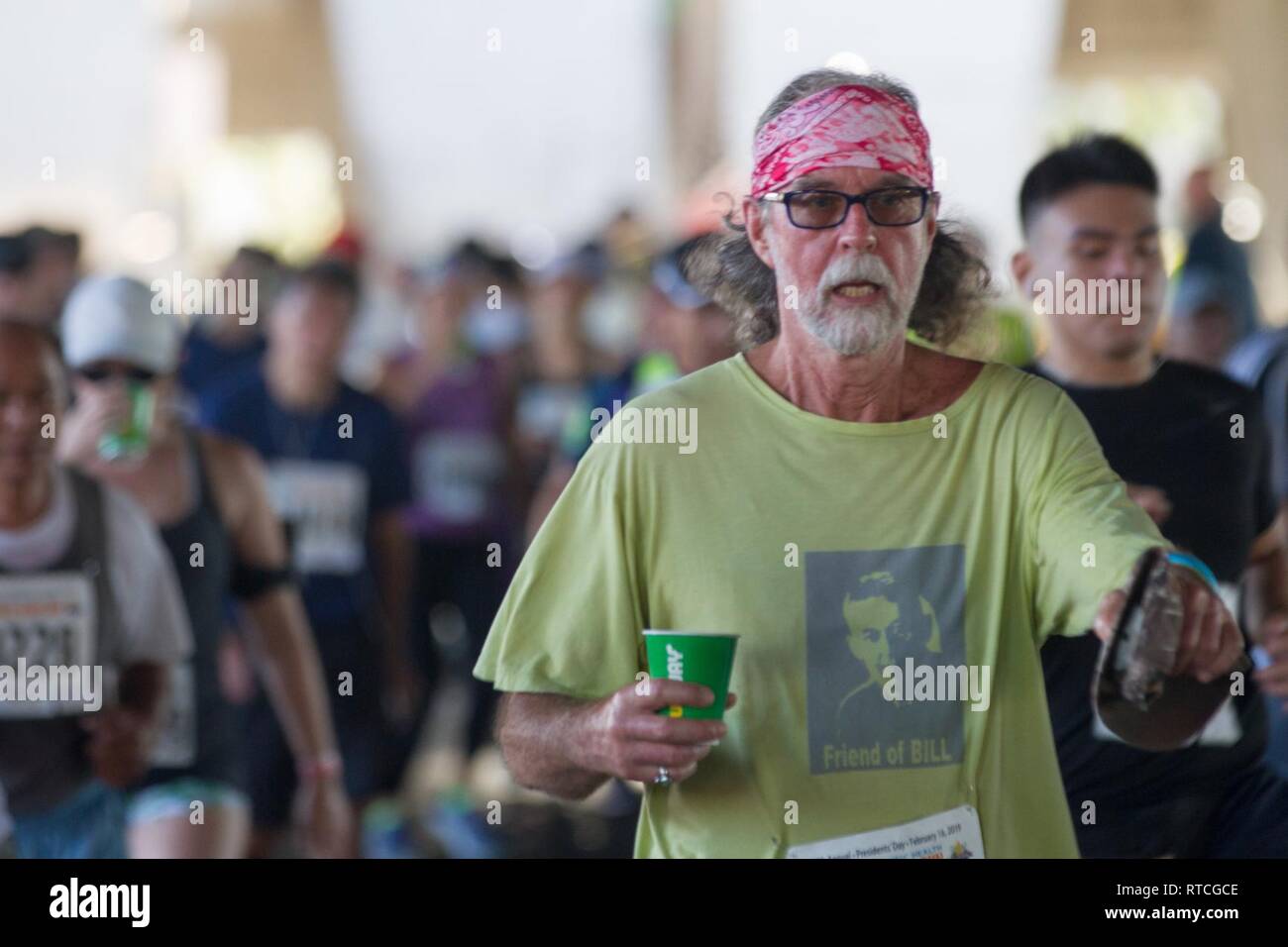 Soldiers of the 25th Infantry Division partner with the community of Hawaii as they participate in the 35th annual Great Aloha Run, Feb. 18, 2019, in downtown Honolulu. The GAR is an 8.35-mile run from the Aloha Tower Lighthouse to the Aloha Stadium that aims to promote a healthier island through Aloha. Stock Photo