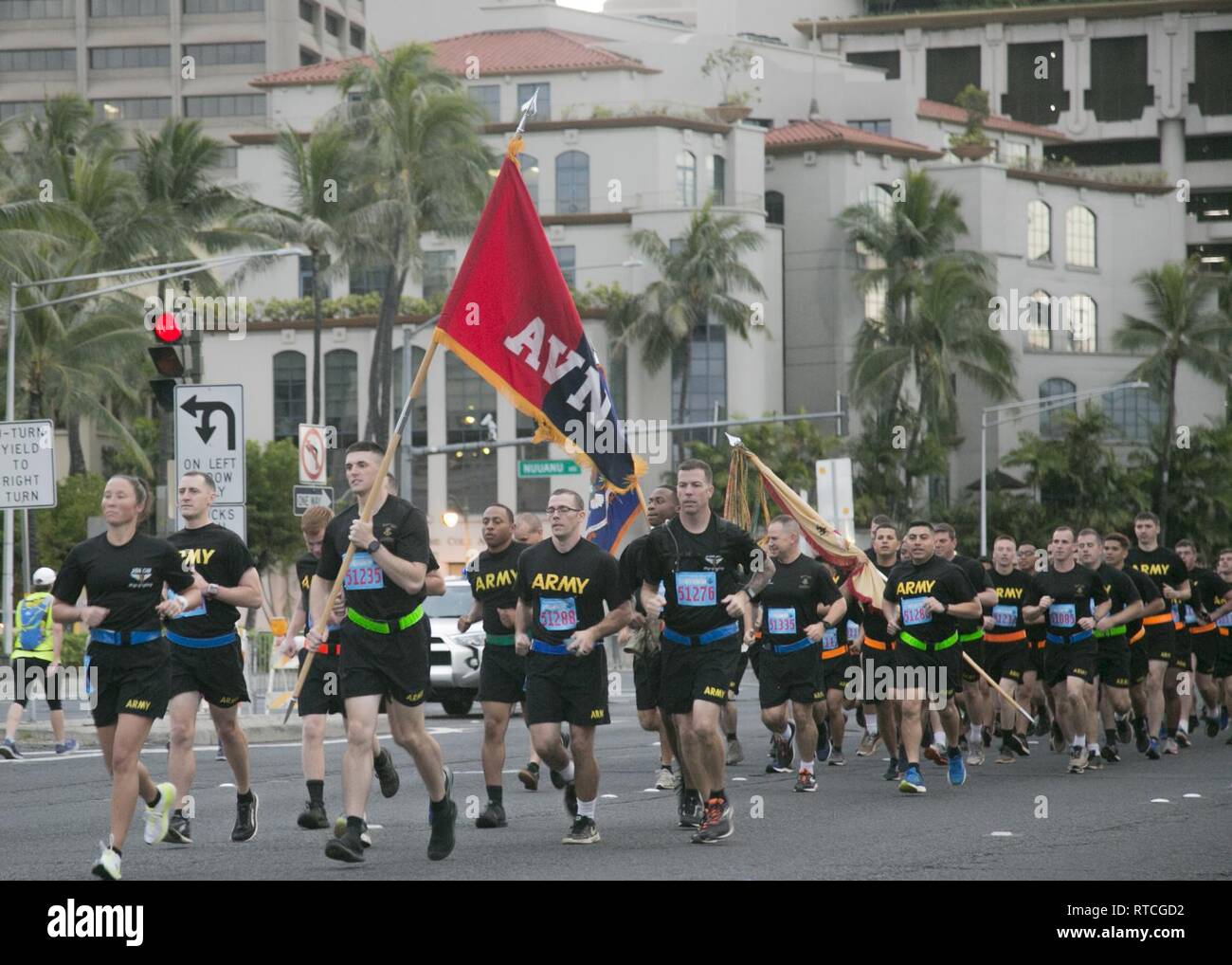 Soldiers from the 25th Combat Aviation Brigade, 25th Infantry Division participate in the 35th annual Great Aloha Run in Honolulu on February 18, 2019. At least  2,000 service members participated in the run, which allows those that participate to give back to both military and civilian communities. Stock Photo