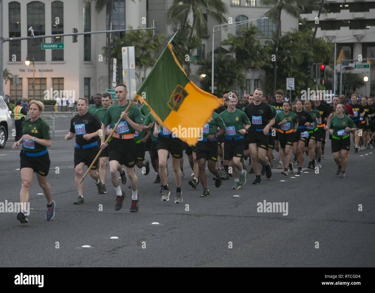 Soldiers from the 8th Military Police Brigade, 8th Theater Sustainment Command participate in the 35th annual Great Aloha Run in Honolulu on February 18, 2019. At least  2,000 service members participated in the run, which allows those that participate to give back to both military and civilian communities. Stock Photo