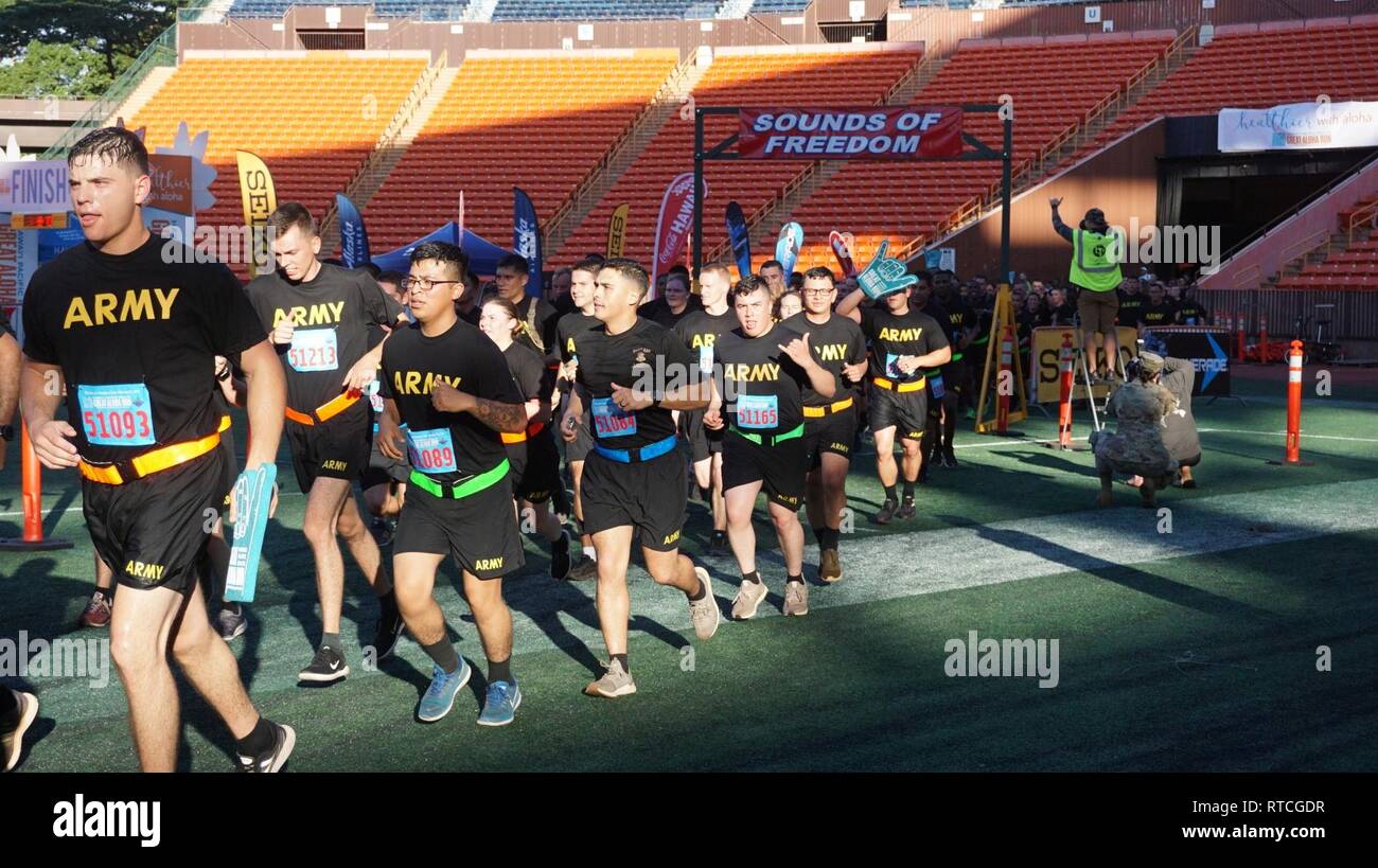 Soldiers from the 25th Infantry Division participated in the Great Aloha Run in Honolulu Feb. 18, 2019. The Tropic Lightning Division, and all U.S. Army-Hawaii units, have been a historic part of the Great Aloha Run since it's beginnings 35 years ago. Stock Photo