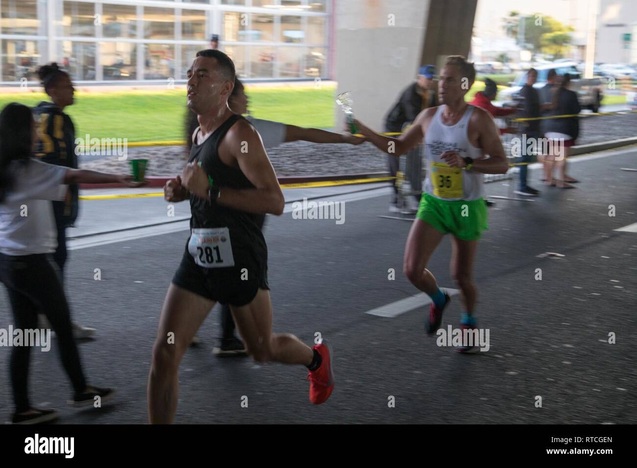 Soldiers of the 25th Infantry Division partner with the community of Hawaii as they participate in the 35th annual Great Aloha Run, Feb. 18, 2019, in downtown Honolulu. The GAR is an 8.35-mile run from the Aloha Tower Lighthouse to the Aloha Stadium that aims to promote a healthier island through Aloha. Stock Photo