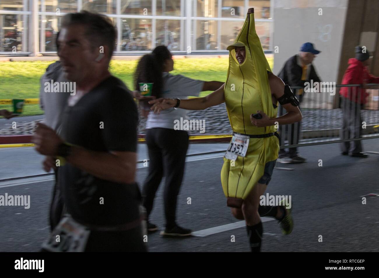 Soldiers of the 25th Infantry Division partner with the community of Hawaii as they participate in the 35th annual Great Aloha Run, Feb. 18, 2019, in downtown Honolulu. The GAR is an 8.35-mile run from the Aloha Tower Lighthouse to the Aloha Stadium that aims to promote a healthier island through Aloha. Stock Photo