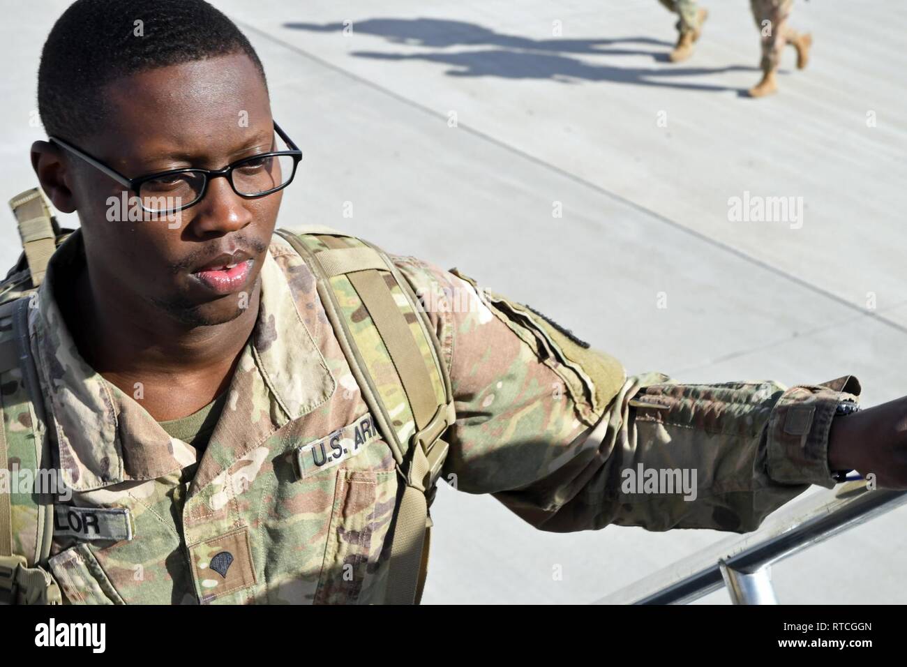 FORT BLISS, Texas – An estimated 300 Soldiers of the torch party for the 155th Armored Brigade Combat Team, Mississippi Army National Guard, boarded the aircraft bound to Jackson, Mississippi from the Silas L. Copeland Arrival/Departure Airfield Control Group, Fort Bliss, Texas, Feb. 18, 2019. The 155th ABCT torch party have just finalized their post-mobilization procedures and actions here, defining them as the first group to return back to their home state. Stock Photo