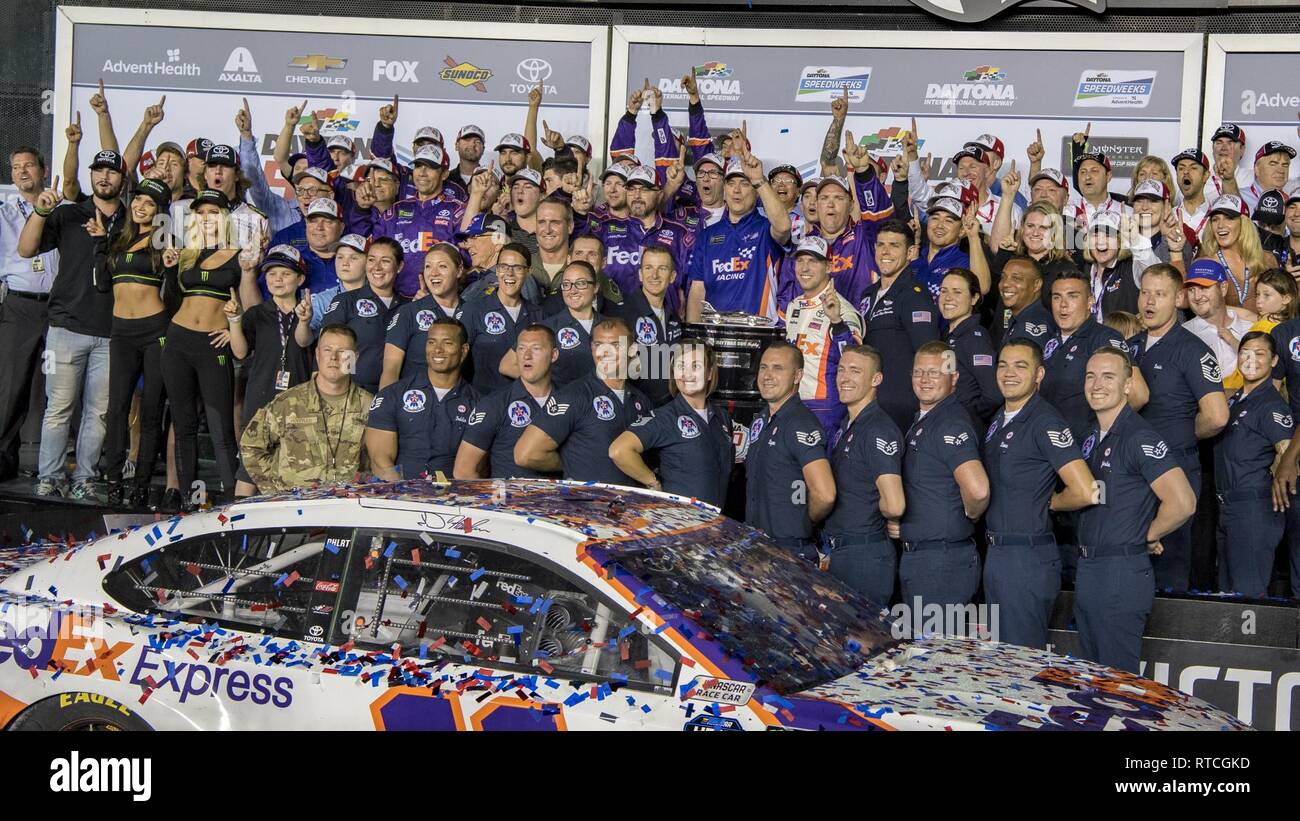 The United States Air Force Air Demonstration Squadron 'Thunderbirds' celebrate with Denny Hamlin after him won the Daytona 500 Feb. 17, 2019 at the Daytona International Speedway. The United States Air Force Air Demonstration Squadron 'Thunderbirds' performed the flyover prior to the race. Stock Photo
