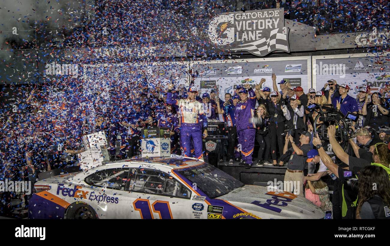 Denny Hamlin, NASCAR driver, celebrates after winning the Daytona 500 Feb. 17, 2019 at the Daytona International Speedway. The United States Air Force Air Demonstration Squadron 'Thunderbirds' performed the flyover prior to the race. Stock Photo