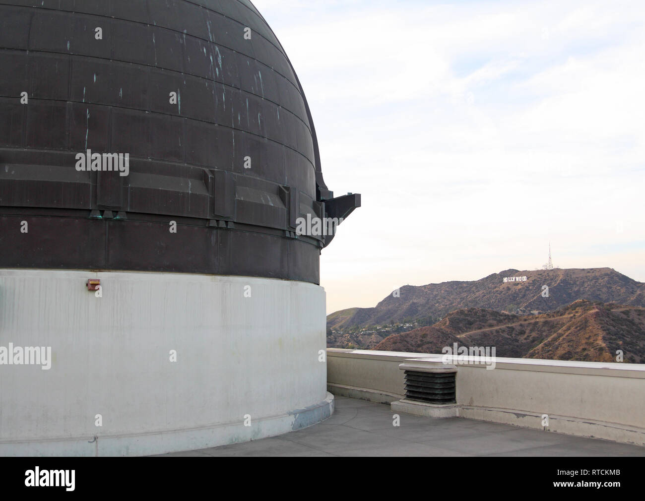 Griffith Observatory dome and the Hollywood Sign, Los Angeles, California, USA Stock Photo