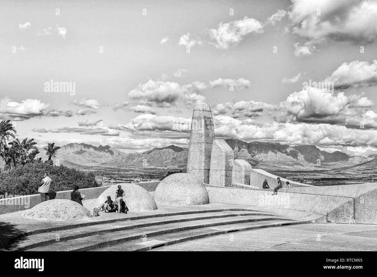 PAARL, SOUTH AFRICA, AUGUST 10, 2018: Tourists at the Afrikaans Language Monument at Paarl in the Western Cape Province. Monochrome Stock Photo