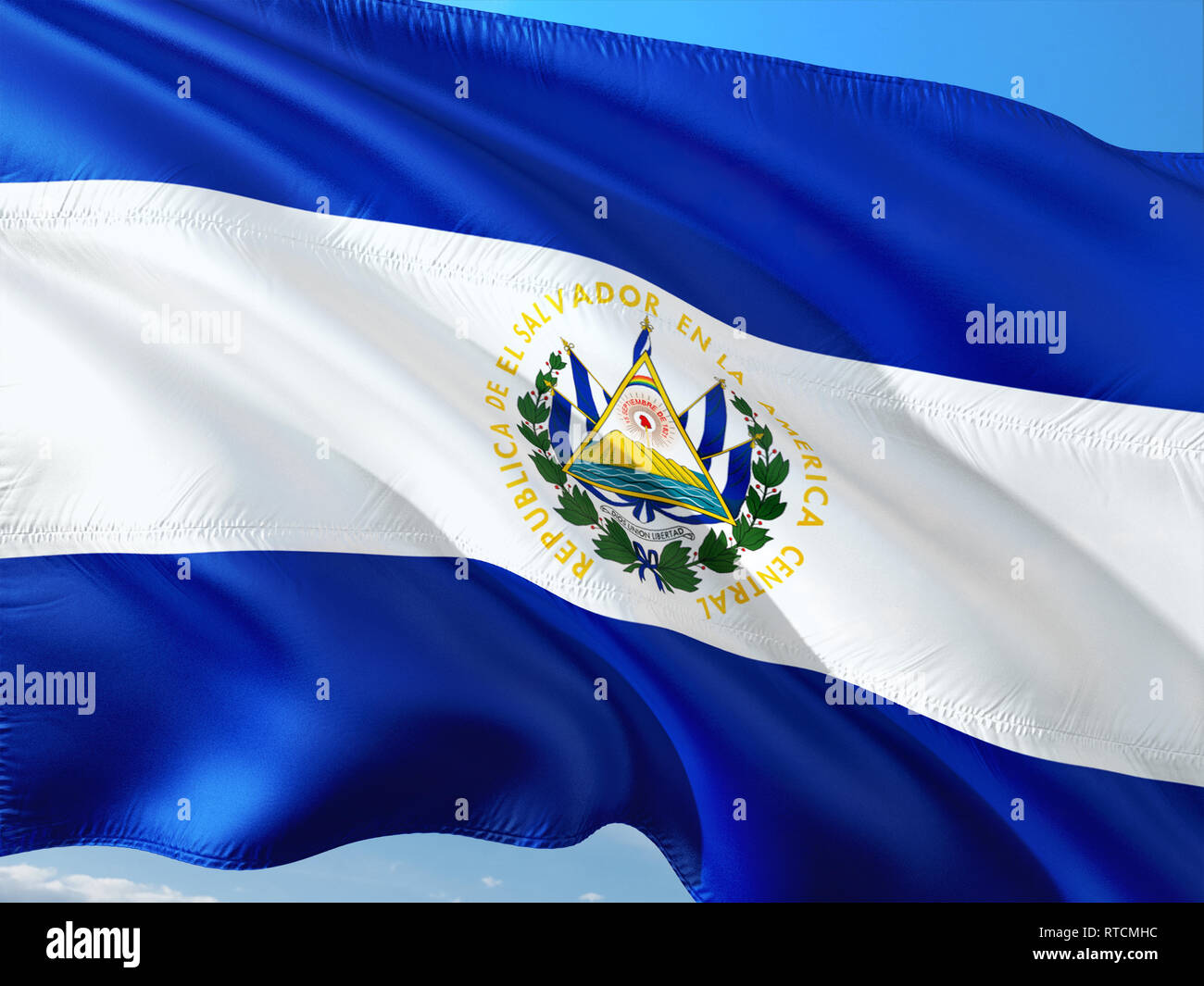 Flag of El Salvador waving in the wind against deep blue sky. High