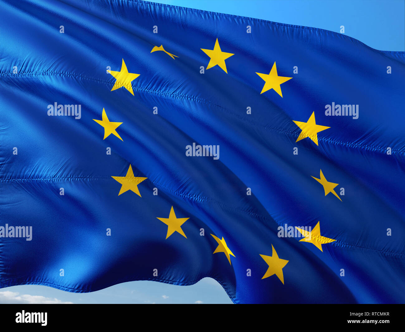 Flag of European Union waving in the wind against deep blue sky. High ...