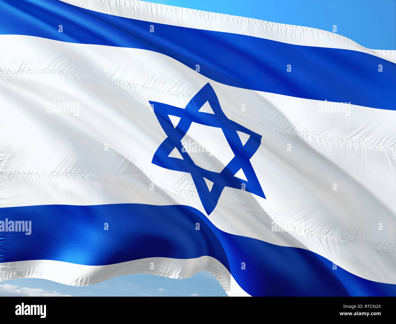 Flag of Israel waving in the wind against deep blue sky. High quality ...
