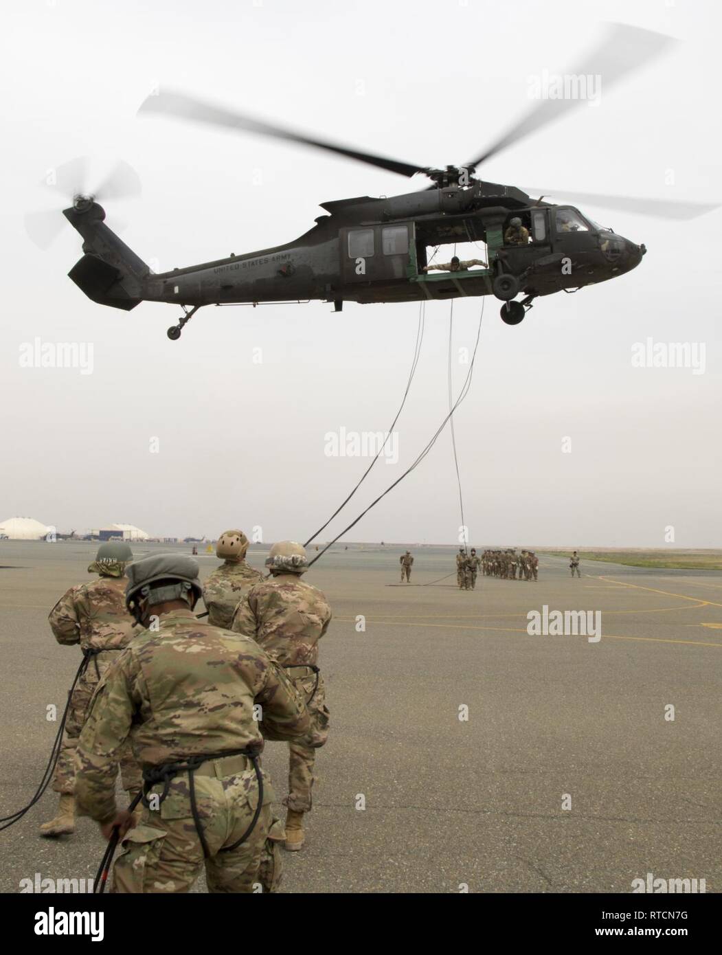 CAMP BUEHRING, Kuwait – Air Assault students practice rappelling out of ...