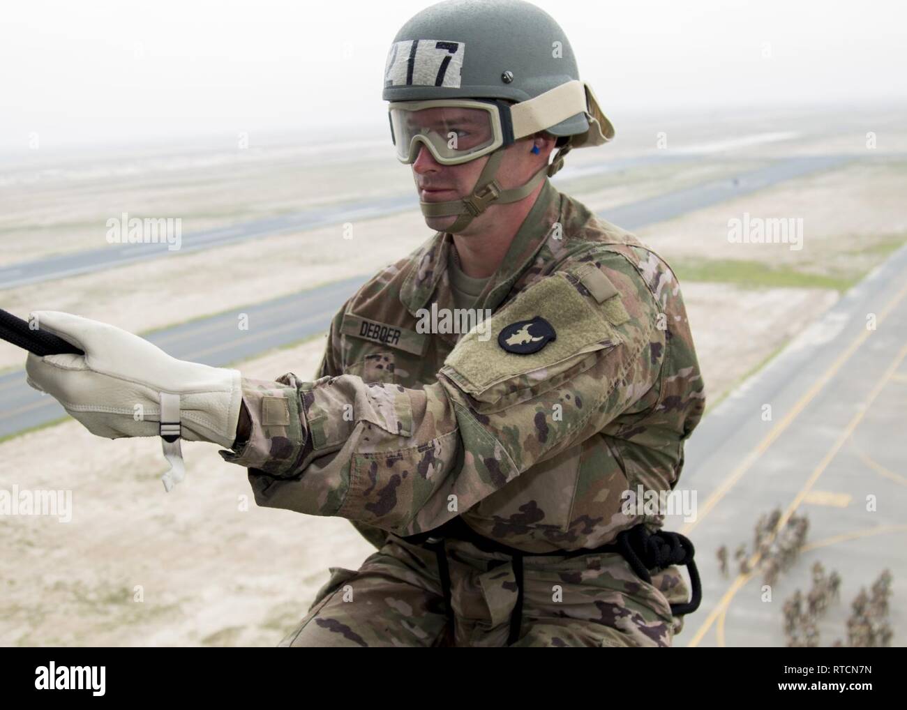 CAMP BUEHRING, Kuwait – Army Sgt. Weston DeBoer, an air traffic control ...