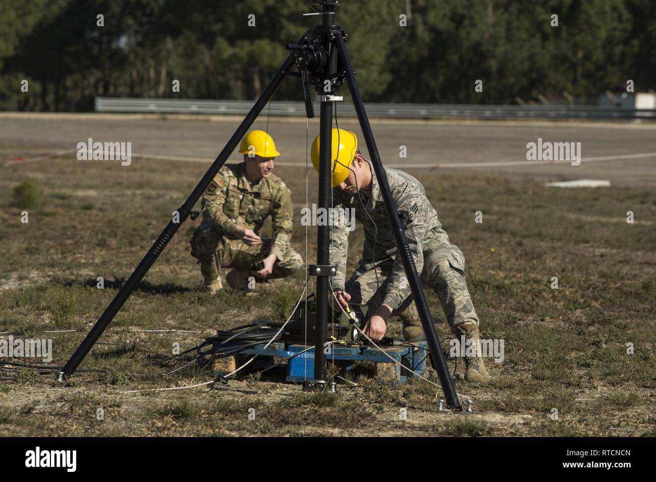 Senior Airman Patrick Bigner, front, 1st Combat Communications Squadron
