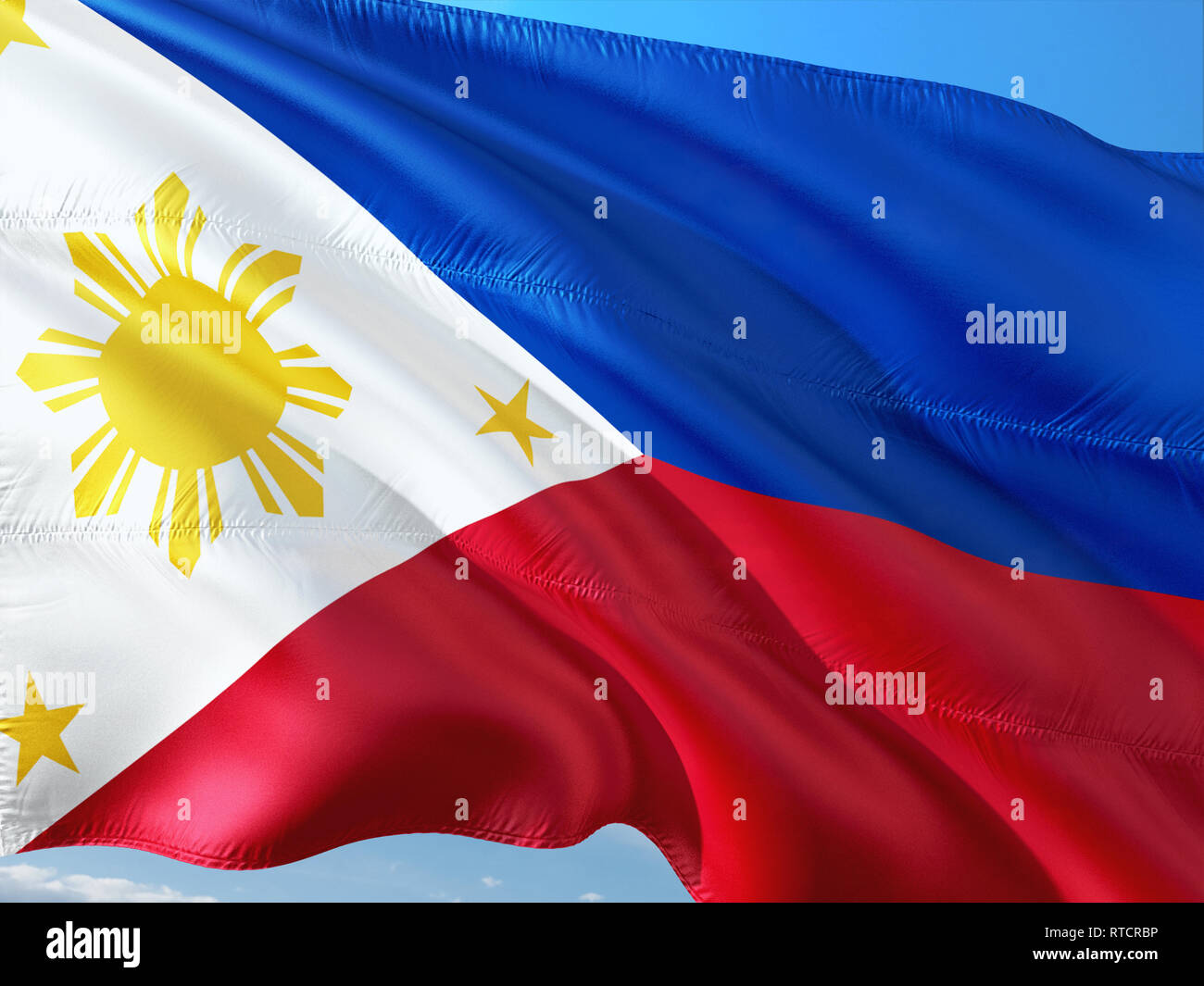 Flag of Philippines waving in the wind against deep blue sky. High ...