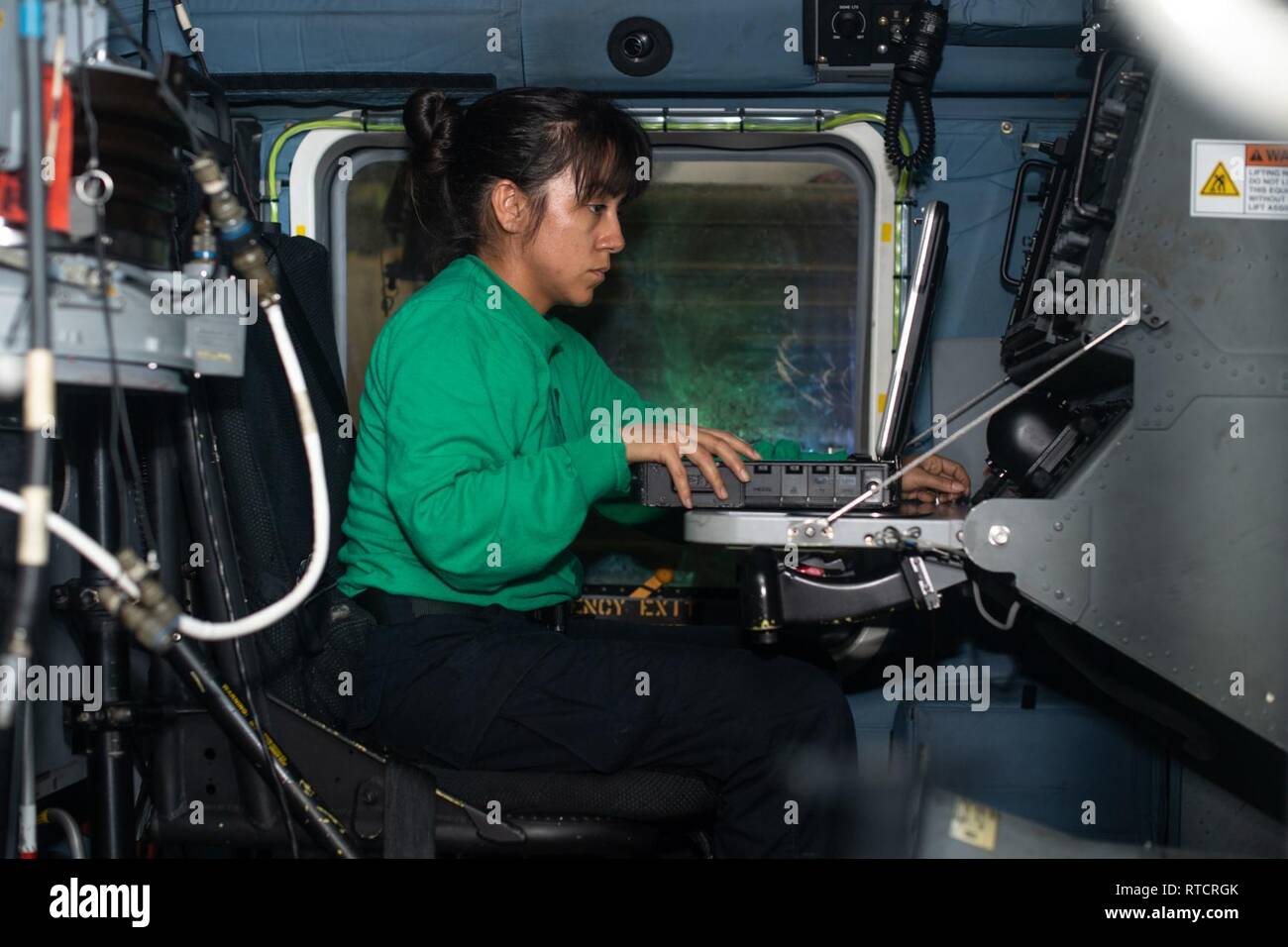 U.S. Navy Aviation Electronics Technician 2nd Class Melissa Muse, from