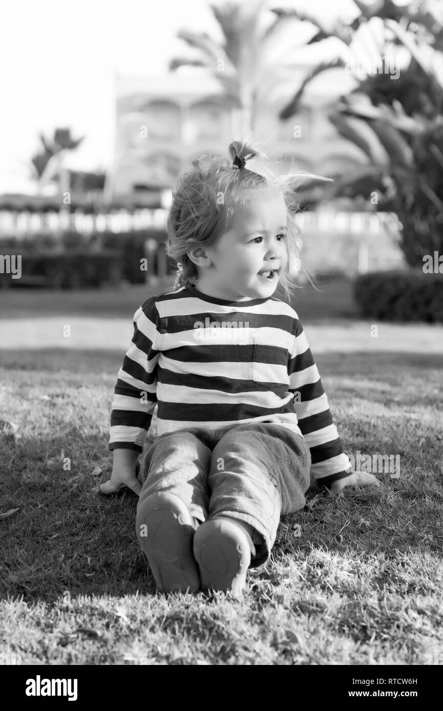 Small Baby Boy Or Cute Child With Happy Face And Blonde Hair In