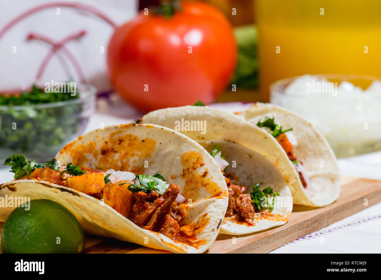 Mexican food, tacos al pastor with ingredients and copy space Stock