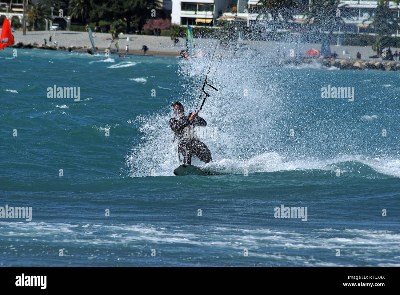 Kite boarder  during a windy day at the end of winter in French riviera. (St Laurent du Var spot) Stock Photo
