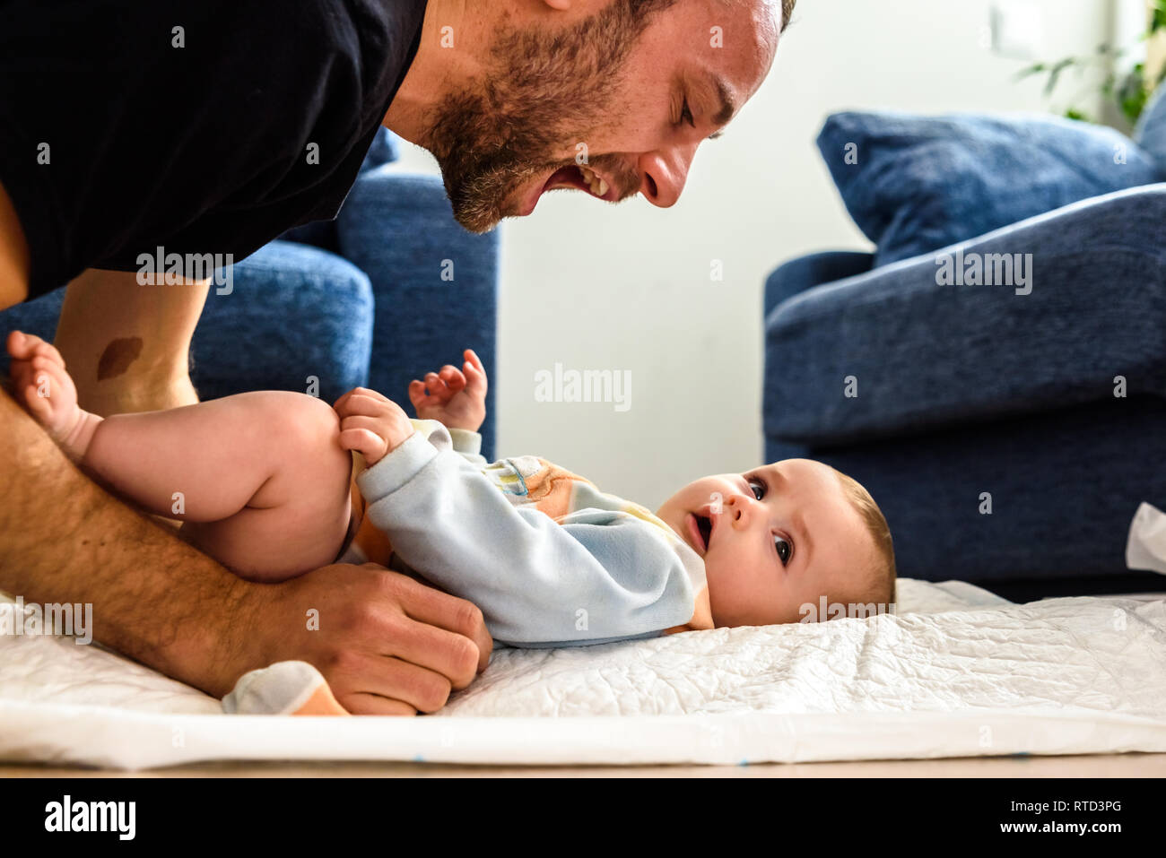 changing diaper while baby sleeping